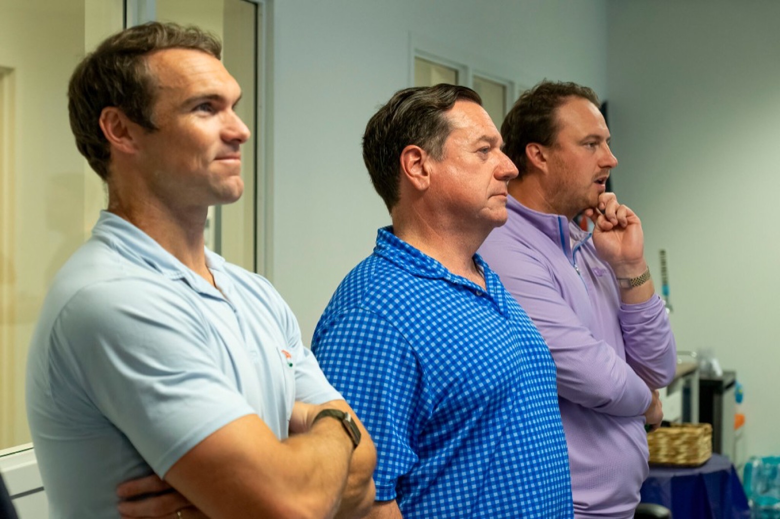 Three attendees listening at the May 28, 2026 AI Roundtable.