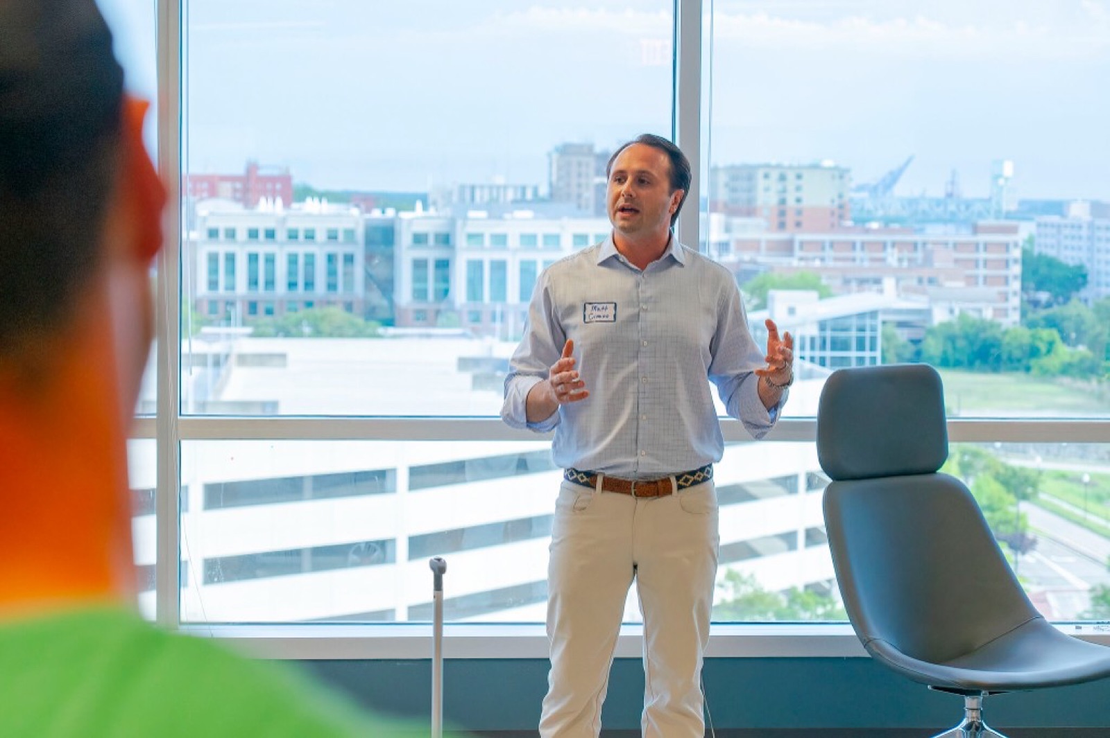 Matt Cimino presenting to the room at the AI Roundtable.