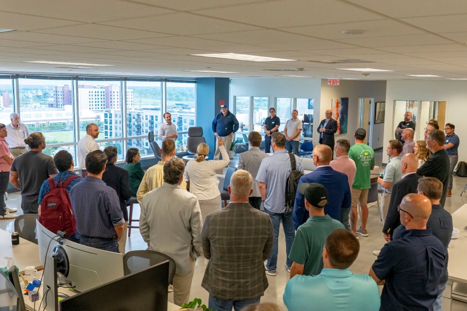 A full room of attendees at the AI Roundtable.